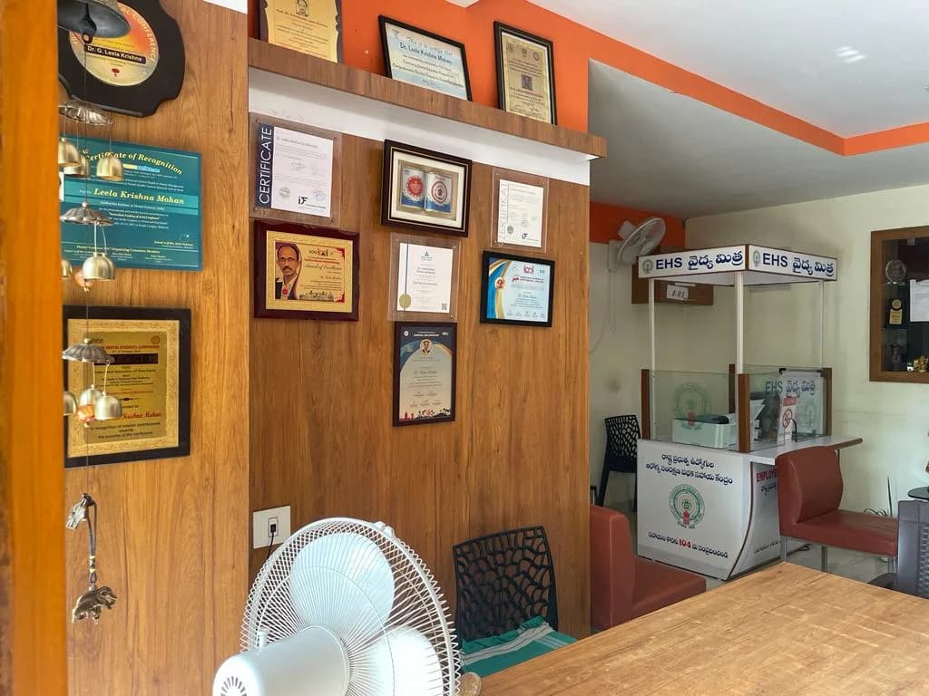Reception area and EHS cashless helpdesk at Krishna Sai EHS Dental Prasadampadu
